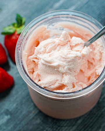 Ninja Creami container with keto strawberry protein ice cream